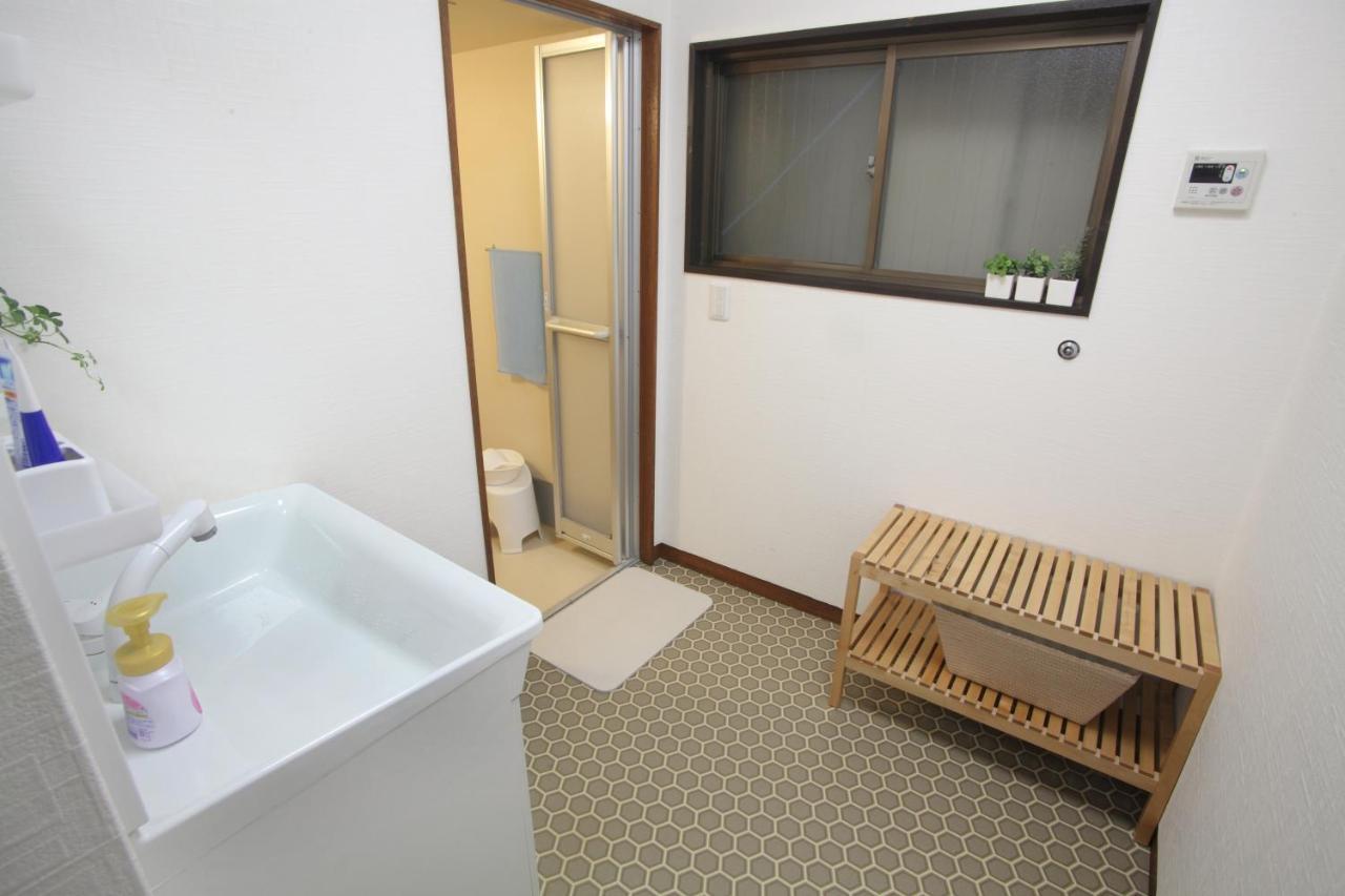 Guest House Futaba Осака Экстерьер фото